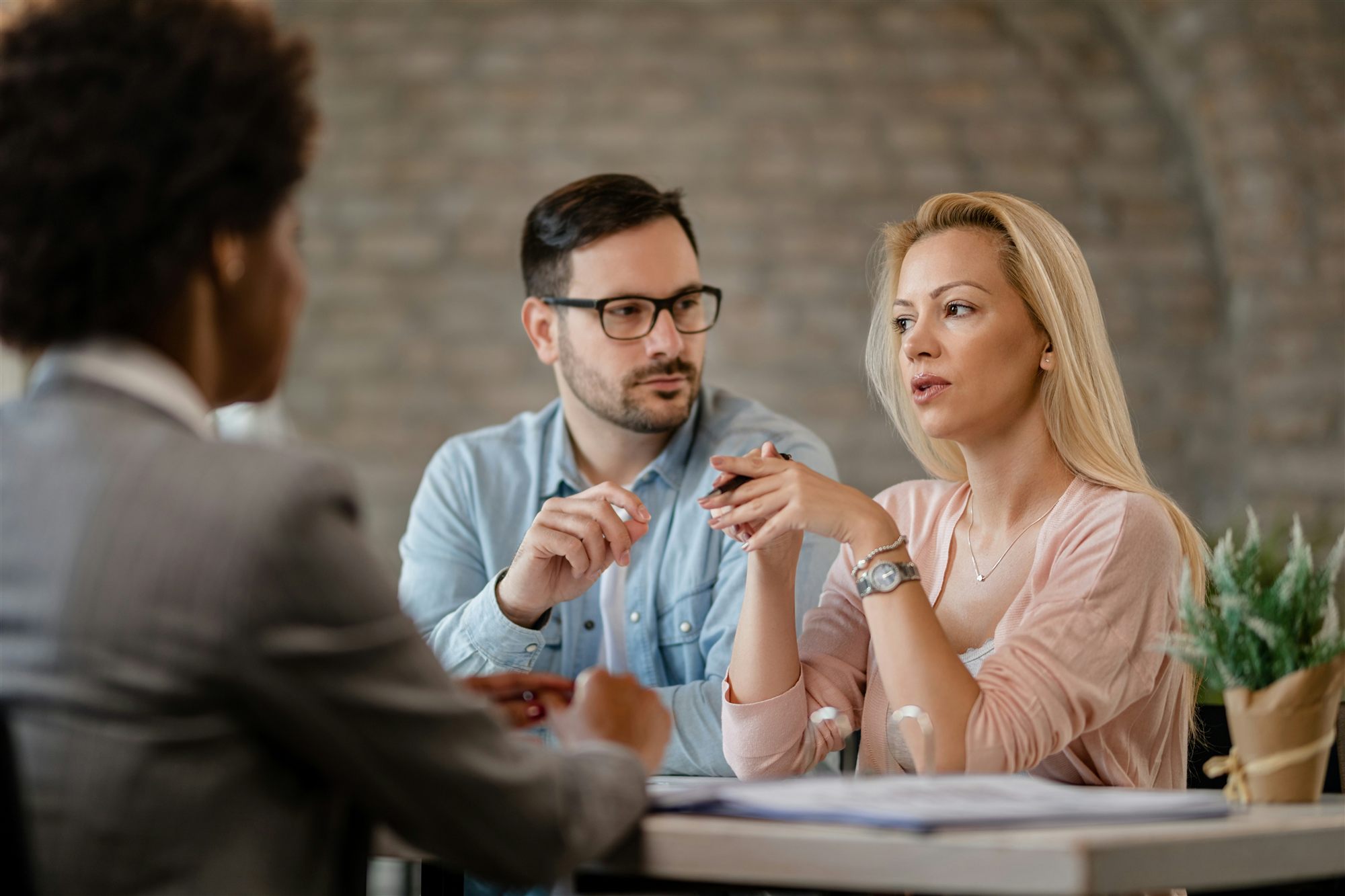 Couple meeting with a financial advisor