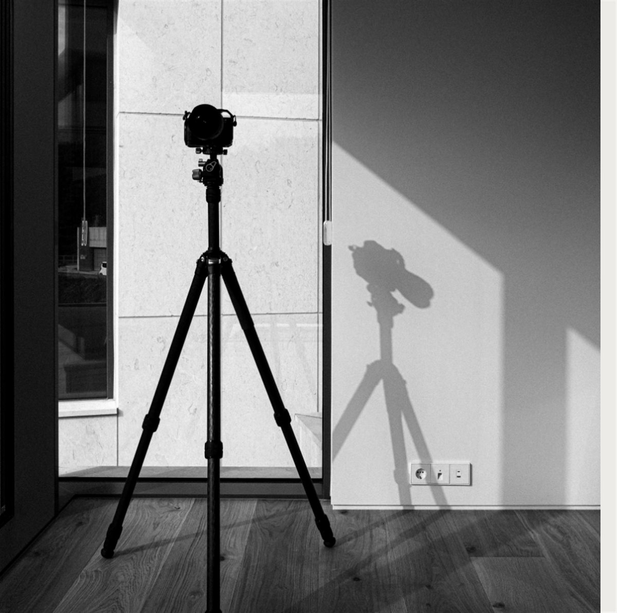 Camera and tripod set up for a listing photoshoot